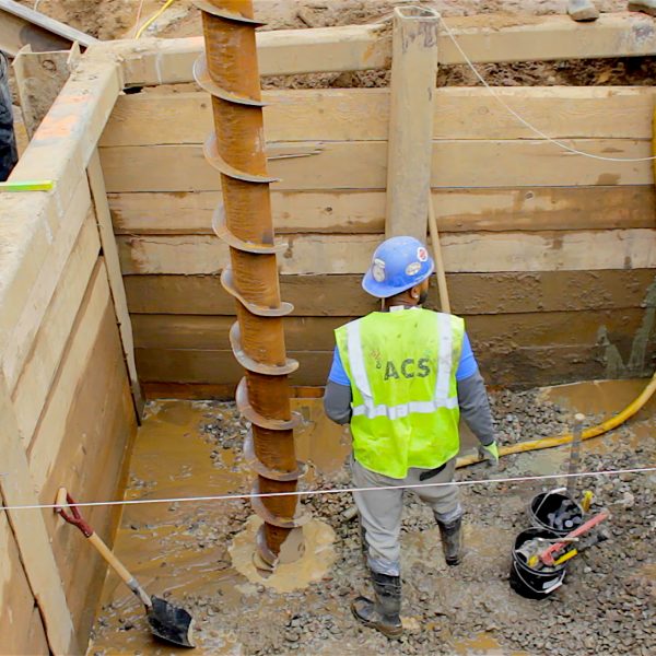 starting helical pile installation